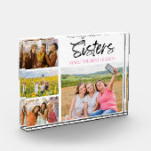 Foto in glazen blok zusters maken de beste vriende (Links)