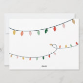 Foto met moderne sieraden en heldere kerstlichten feestdagenkaart (Achterkant)