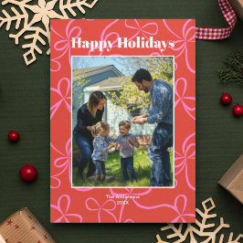 Foto met patroon van rode en roze linten in vetged feestdagenkaart