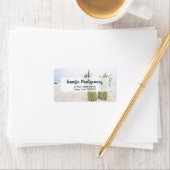 Foto van 2 ananassen op een strand adres etiket (Insitu)