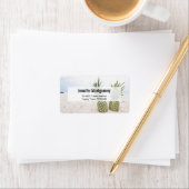 Foto van 2 ananassen op een strand adres etiket (Insitu)