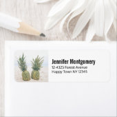 Foto van 2 ananassen op een strand etiket (Insitu)