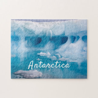 Foto van Antarctica ijsberg met tekst Legpuzzel