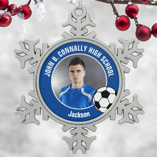 Foto van blauwe voetballer met spirit van de midde tin sneeuwvlok ornament