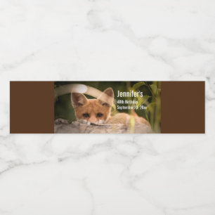 Foto van een Cute Little Oranje Fox Waterfles Etiket