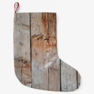 Foto van een houten paneel sluiten kleine kerstsok
