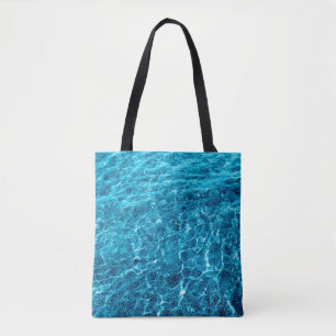 Foto van een macrolepel blauw, helder zee water tote bag