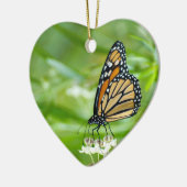 foto van een monboogvlindervormig siervormig versi keramisch ornament (Links)