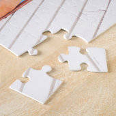 Foto van een vrouw die ontspannen is in een zwemba legpuzzel (Zijkant)