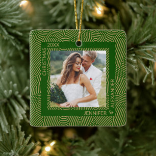 Foto van gouden en groene paren keramisch ornament