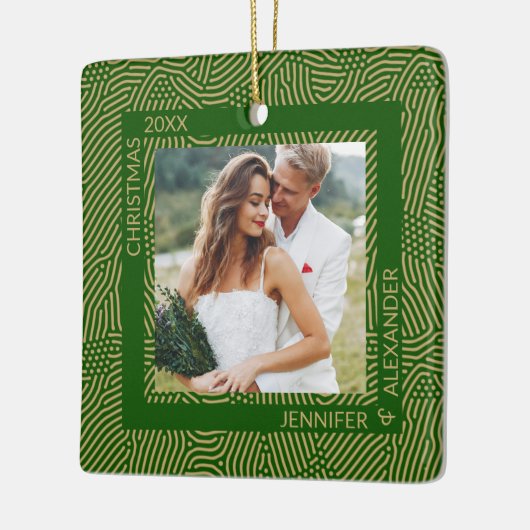 Foto van gouden en groene paren keramisch ornament (Links)