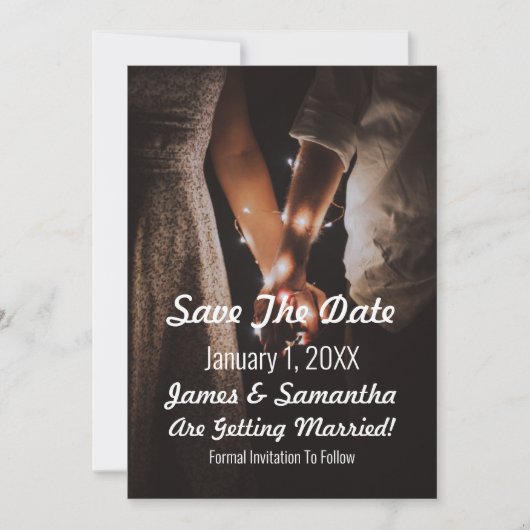 Foto van hand in hand met kerstverlichting save the date (Voorkant)