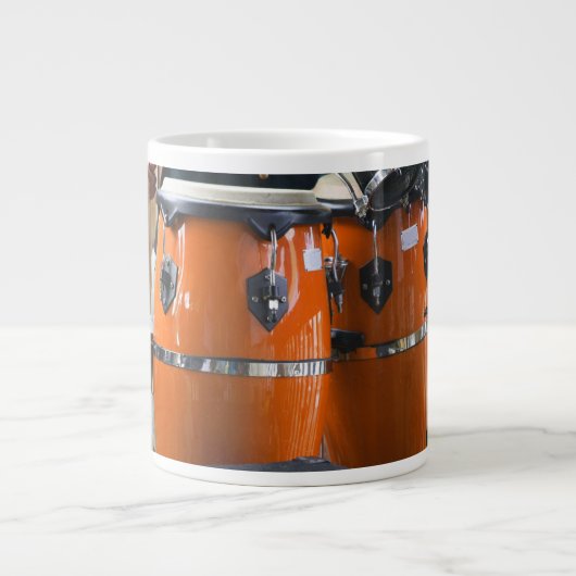 Foto van heldere oranje conga drums grote koffiekop (Voorkant)