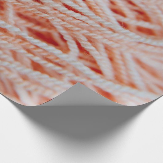 Foto van lichtkoraalroze garen cadeaupapier (Hoek)