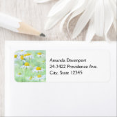 Foto van  madeliefjes in een veld etiket (Insitu)