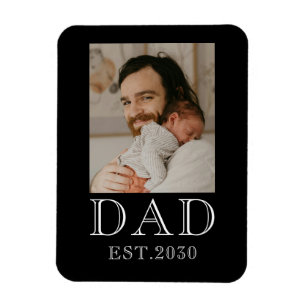 Foto van papa die baby krijgt magneet