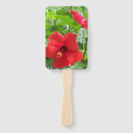 Foto van rode tropische hibiscus bloemen op een handwaaier