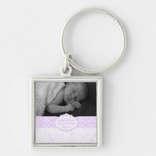 Foto van Roze Swirly Lace Baby Sleutelhanger
