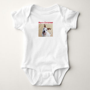 Foto van Smiling Dog Wearing Reindeer Antlers Romper
