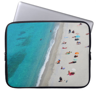 Foto van uitzicht van vogelaars op het strand laptop sleeve