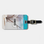 Foto van Zeeschelpen op een zandstrand Bagagelabel (Voorkant horizontaal)