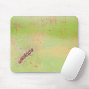 Fotofoto van groene metaallas muismat