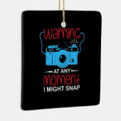 Fotograaf kan op elk moment magnetisch zijn keramisch ornament (Rechts)