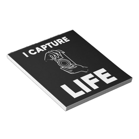 Fotograaf vangt leven notitieblok (Schuin)