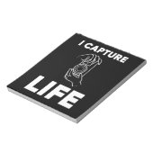 Fotograaf vangt leven notitieblok (Linkerzijde)