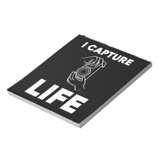 Fotograaf vangt leven notitieblok (Linkerzijde)