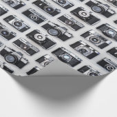 Fotografen voor de vergaarbak van de oude camera cadeaupapier (Hoek)