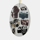 fotografie camera fotograaf in nood keramisch ornament (Links)