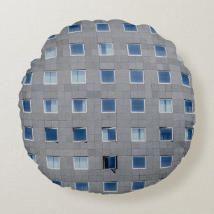 Fotografie grijs beton rond kussen