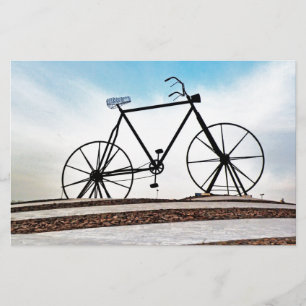 Fotografie van fietsbeeldhouwwerk briefpapier
