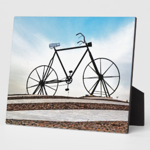 Fotografie van fietsbeeldhouwwerk fotoplaat