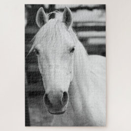 Fotografie van zwarte en witte paarden legpuzzel
