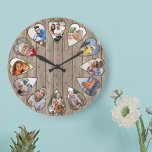 Foto's met hartvorm Rustic Brown Wood Large Clock Grote Klok<br><div class="desc">Creëer uw eigen meerfotoklok. Het fotomalplaatje is opstelling voor u om 12 foto's toe te voegen die in een hart gevormd lijst worden getoond. Het ontwerp gebruikt de verticale foto's van het portret voor alle aantallen behalve 3 en 9 die in landschapshorizontaal formaat zijn. Het klokgezicht heeft eenvoudige getallen met...</div>