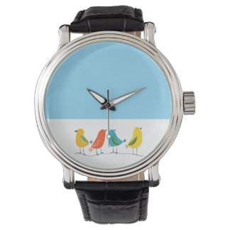 Four Birds Perched on a Twig Horloge
