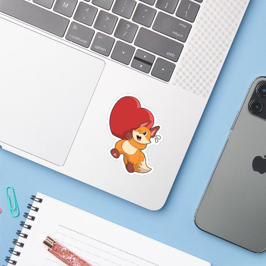Fox bij liefde met hart sticker (Laptop met iPhone)