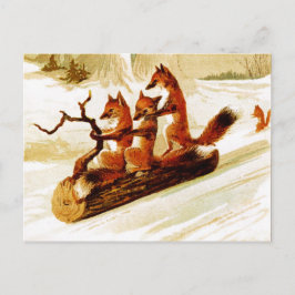 Foxes die door de sneeuw op een logboek lopen briefkaart