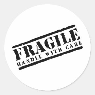 Fragile handgreep met ontwerp van de zorg ronde sticker