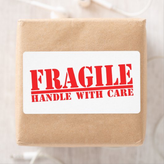 Fragile handgreep met rode tekst voor verzendlabel (Insitu)