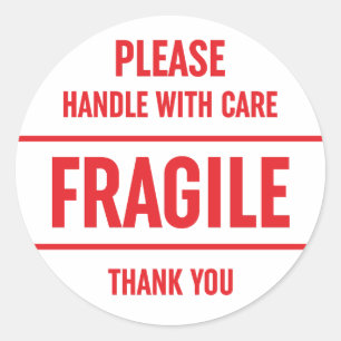 Fragile handgreep met waarschuwing ronde sticker