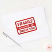 Fragile handgreep met zorg ovale sticker (Envelop)
