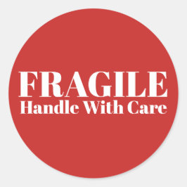 Fragile handgreep met zorg ronde sticker