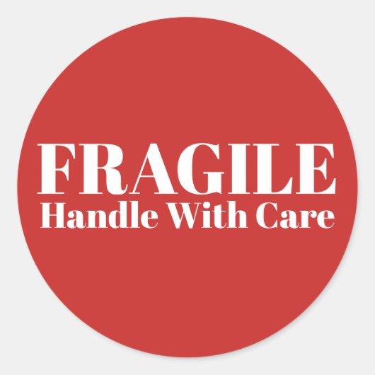 Fragile handgreep met zorg ronde sticker (Voorkant)