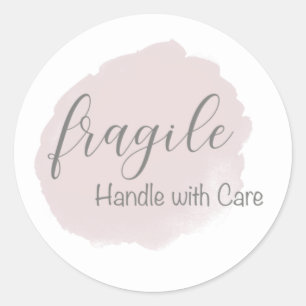 Fragile handgreep met zorg ronde sticker