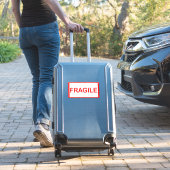 Fragile handgreep met zorg sticker (Koffer Insitu)