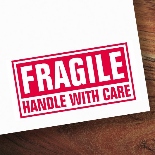 Fragile handgreep met zorg zelfinktende stempel