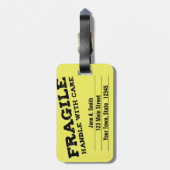 Fragile, handvat met zorg, geel bagagelabel (Achterkant verticaal)